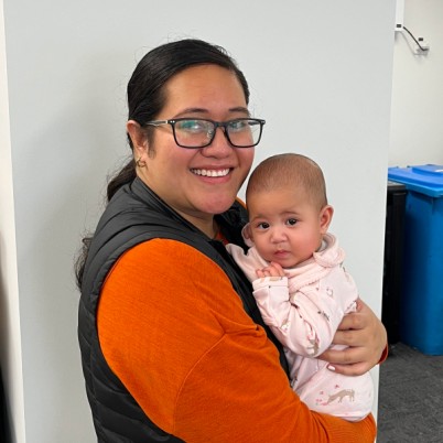 picture of a woman holding a baby